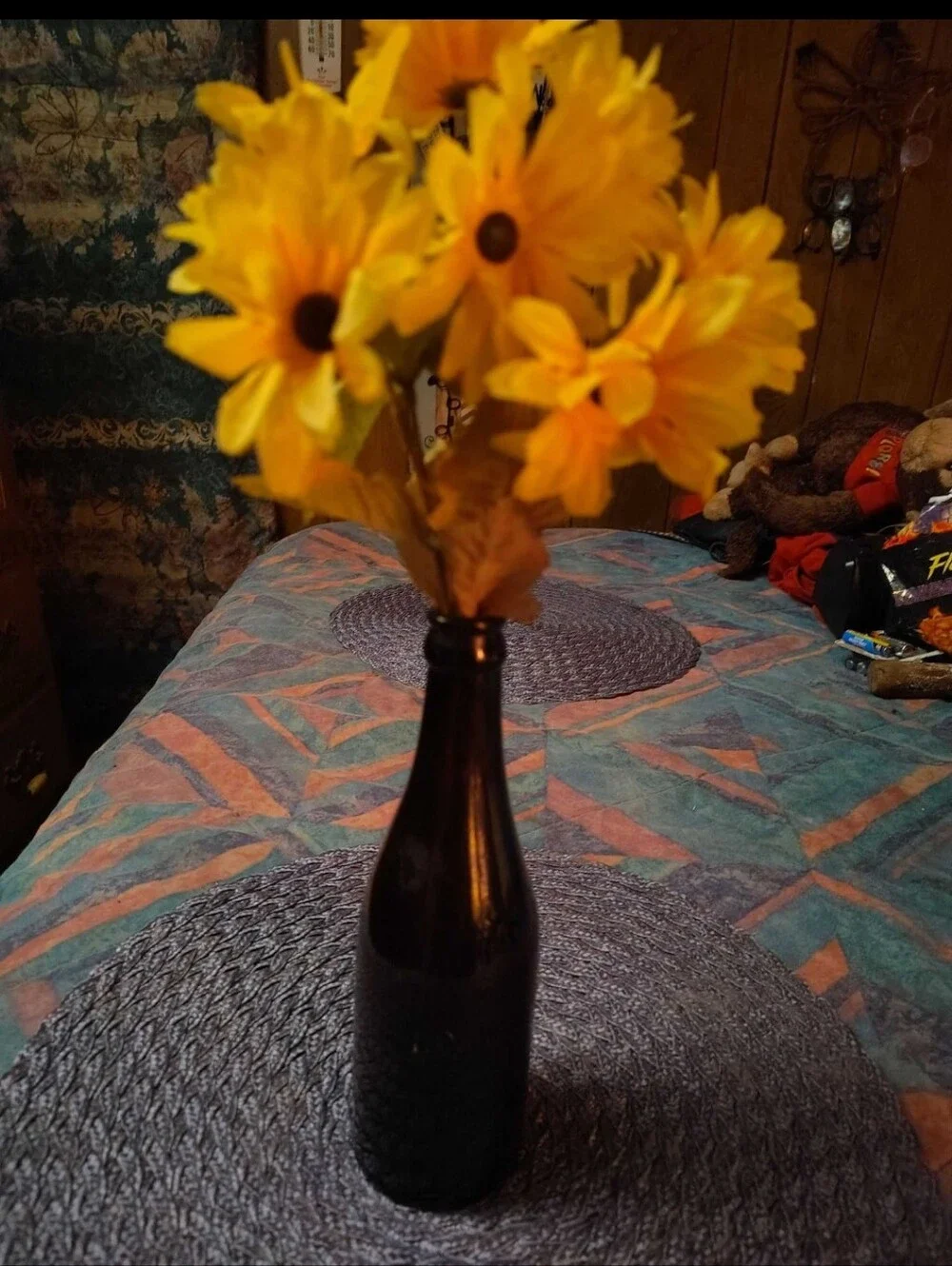 Black Decorative Bottle Vase with Yellow Sunflower Stems